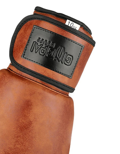 Load image into Gallery viewer, Vintage boxing gloves
